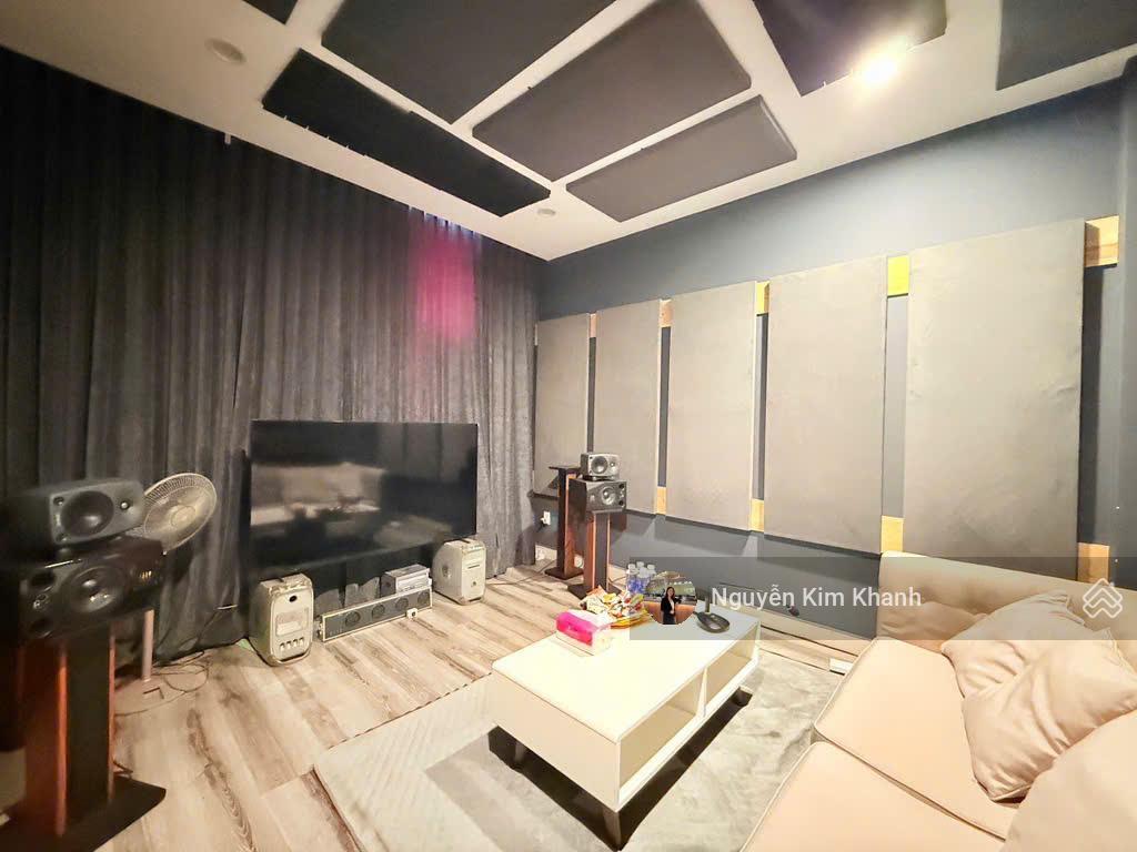Hxh sát bên phan đăng lưu  103m2 6 tầng thang máy  ngang 9m  dt sàn 600m2  kts thiết kế riêng