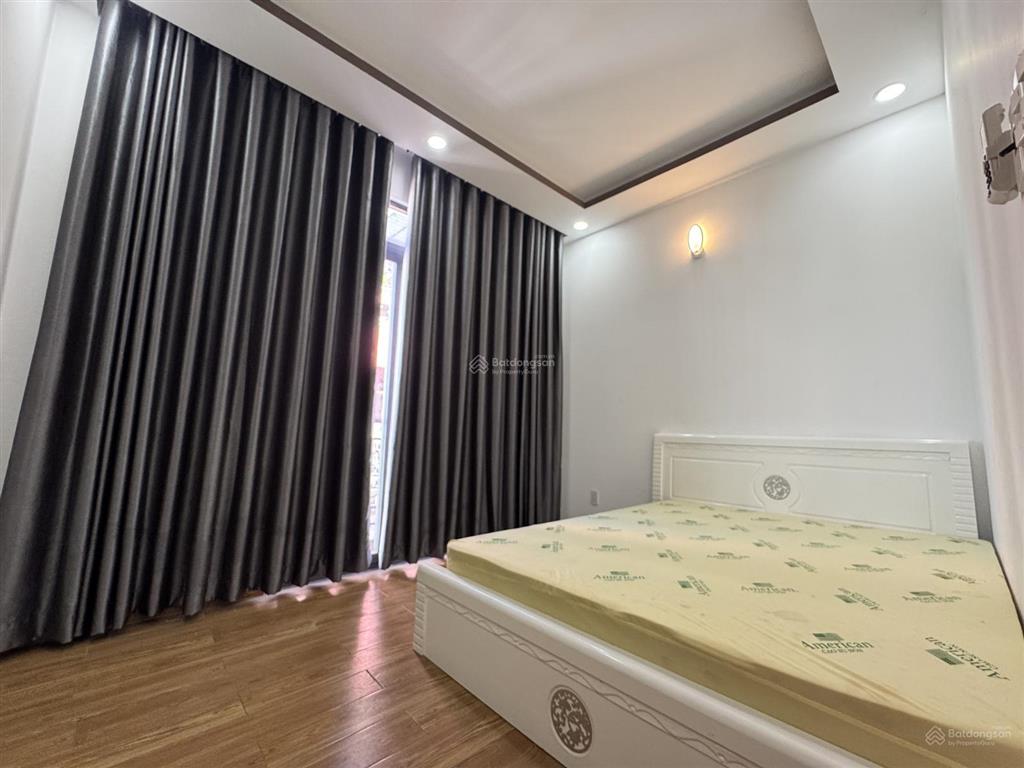 Ô tô ngủ trong nhà 5 tầng lầu đường lê đức thọ gần chợ xóm mới