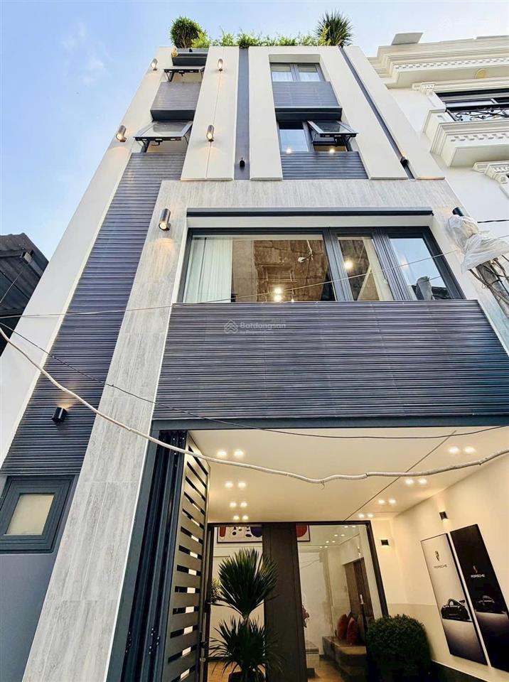 Siêu vị trí 5 tầng lầu xây mới  hẻm ô tô cạnh công viên làng hoa kiến trúc đẹp full nội thất