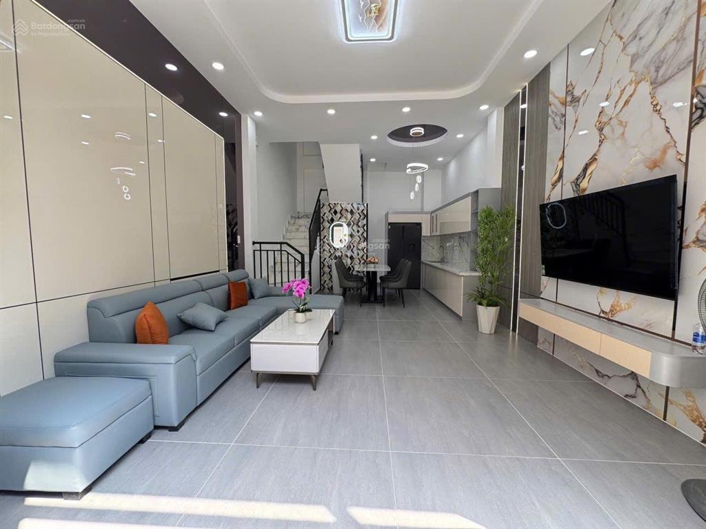 Xây mới  4 tầng lầu  hẻm xe hơi thông  ngang rộng  full nội thất  tiện mở văn phòng công ty