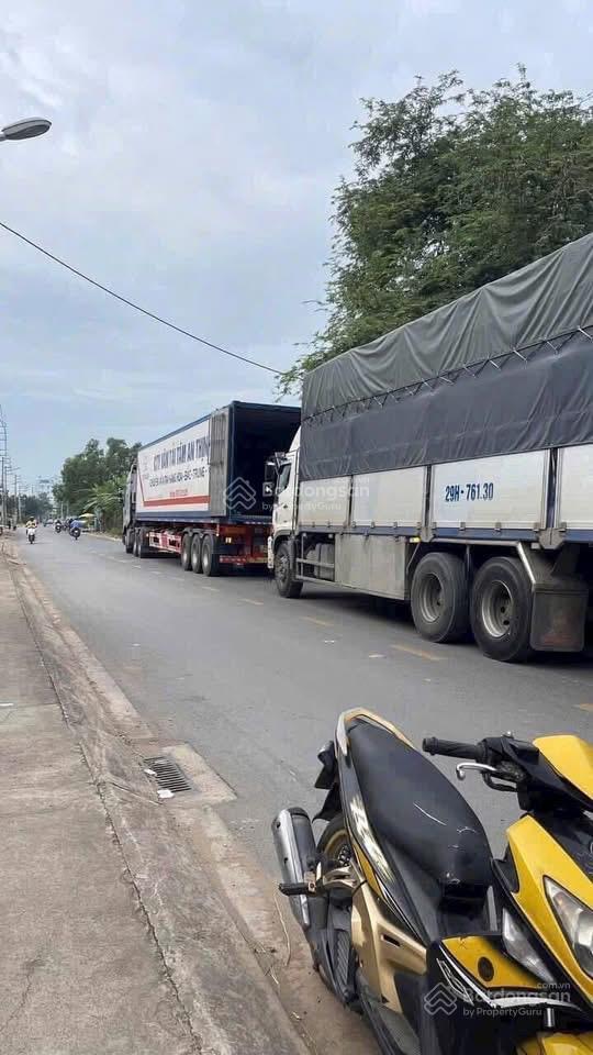 Gđ cần bán lô đất 4867m2 mặt tiền phạm văn sáng bà điểm hóc môn, giá 7,5tr/m2