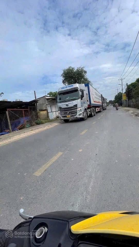 Gđ cần bán lô đất 4867m2 mặt tiền phạm văn sáng bà điểm hóc môn, giá 7,5tr/m2