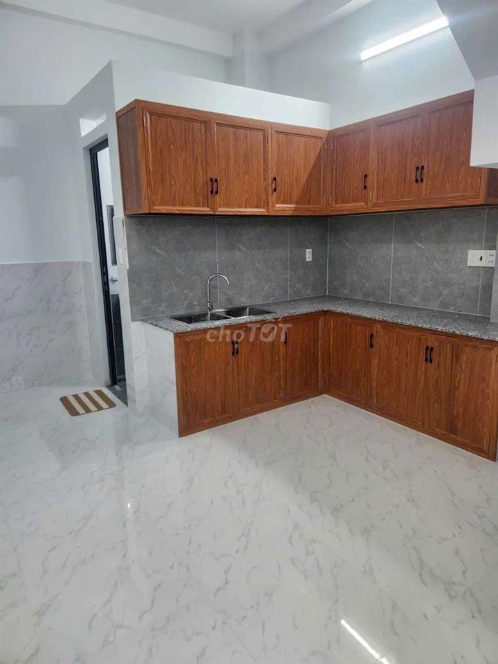 Nhà mới 4x10m 2lầu 2pn 2wc p thờ sân thượng trước sau. Đs 1 p16 gv