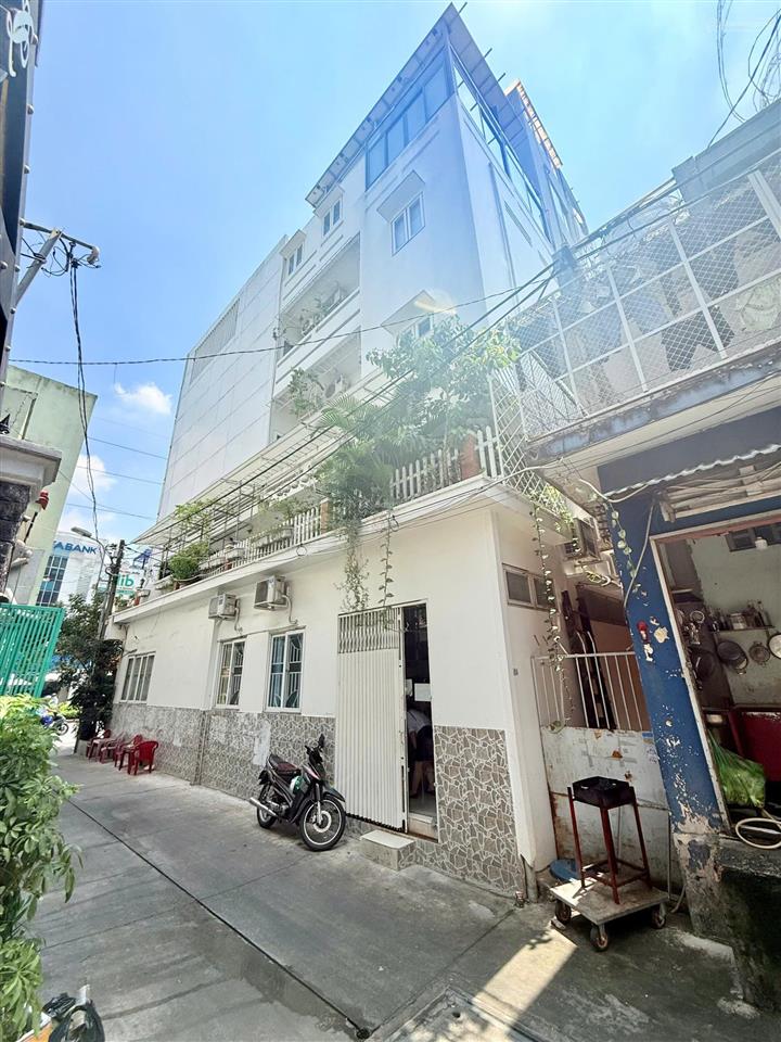 Bán nhà góc 2 mt lạc long quân, p 5, q 11 dt 6,3x15m cn 90m2  4 tầng chỉ 27 tỷ
