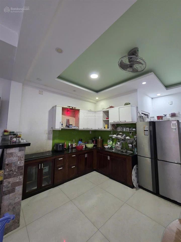 Bán căn nhà mt kinh doanh huỳnh văn luỹ  tp mới kế đường lê lợi , bình dương ( nay tp hcm )