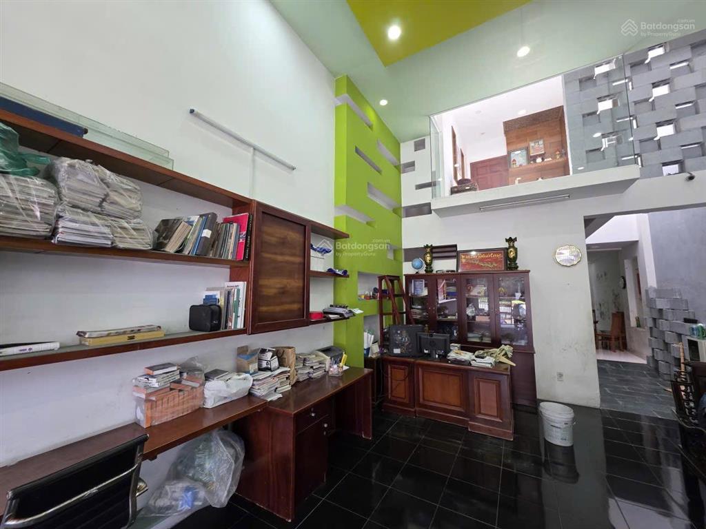 Bán căn nhà mt kinh doanh huỳnh văn luỹ  tp mới kế đường lê lợi , bình dương ( nay tp hcm )
