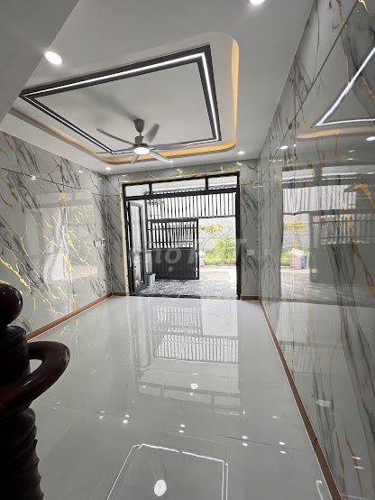 Bán nhà 1 trệt 1 lầu gần ngã tư đồi mồi dĩ an bình dương