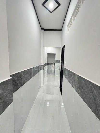 Bán nhà 1 trệt 1 lầu gần ngã tư đồi mồi dĩ an bình dương
