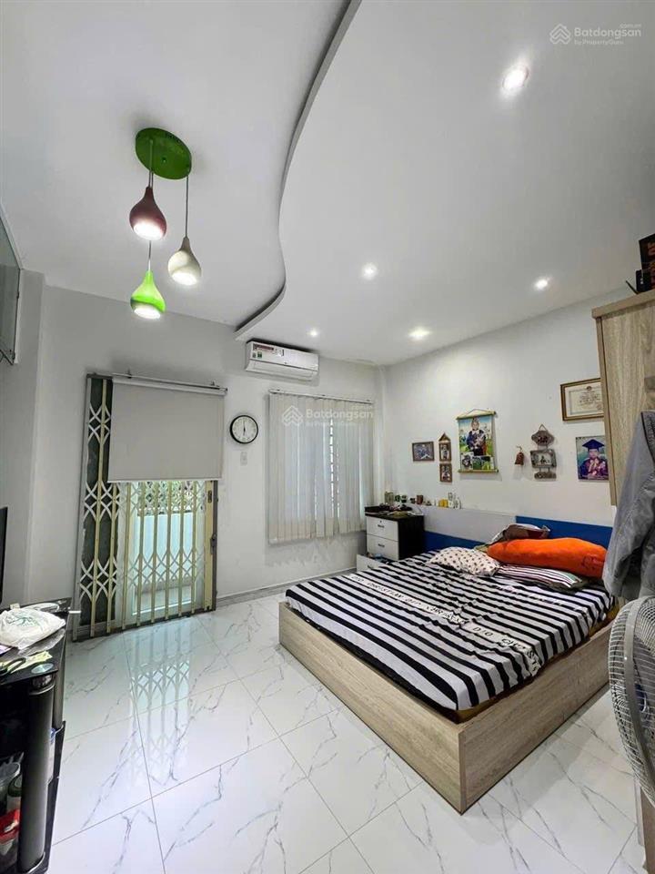 Nhà mới 4 tầng st hẻm 7m xe hơi ngủ nhà gò dầu | 4x13m 4pn 4wc | giá 6.4 tỷ  0936 999 ***