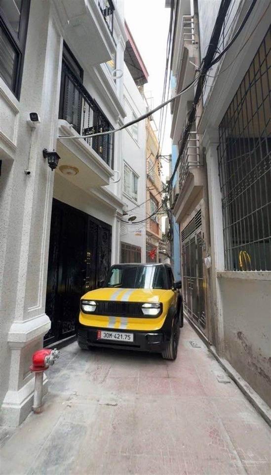 Bán nhà giảng võ 45m2 xây 7 tầng thang máy ngõ rộng vf5 đi qua được giá 12 tỷ