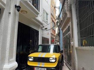 Bán nhà giảng võ 45m2 xây 7 tầng thang máy ngõ rộng vf5 đi qua được giá 12 tỷ