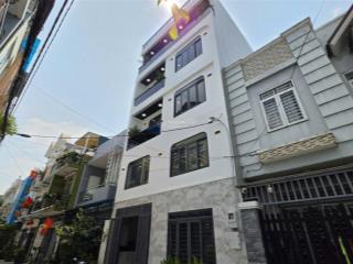 Nhà phố 4 tầng ngang 7m thang máy kdc công viên tl37 an phú đông  7. x tỷ