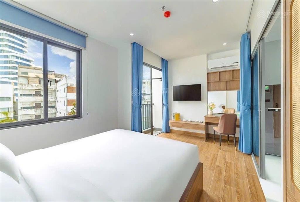 Bán tòa căn hộ mt 5m5 mỹ khê sát võ nguyên giáp. dt 80m² gồm 12p dthu tự vận hành 150tr/th ổn định