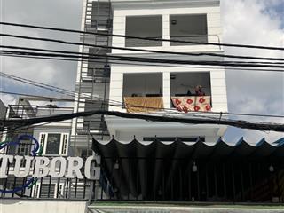 Bán gấp tòa nhà chdv mặt tiền phú định, 8x25m, đang kinh doanh chdv 20 phòng  giá 13.2 tỷ