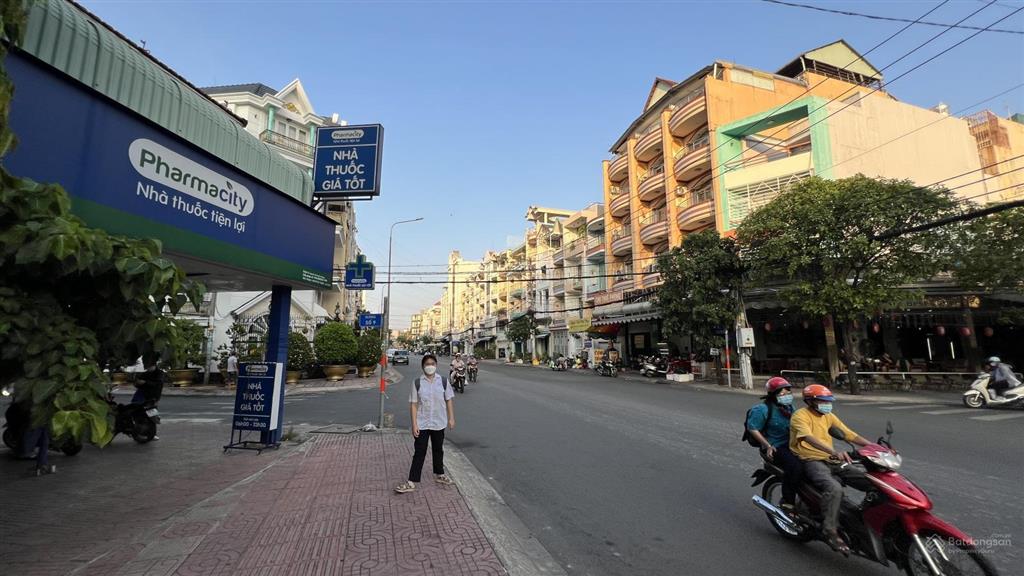 Bán nhà góc 2 mặt tiền chợ lớn, gần đường 23 bình phú, quận 6  dt 7x18m  4 tầng  giá 18 tỷ