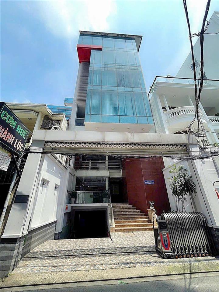Tòa nhà đường trần hưng đạo. dt 12*23m. hầm + 6 tầng. giá 65 tỷ thương lượng