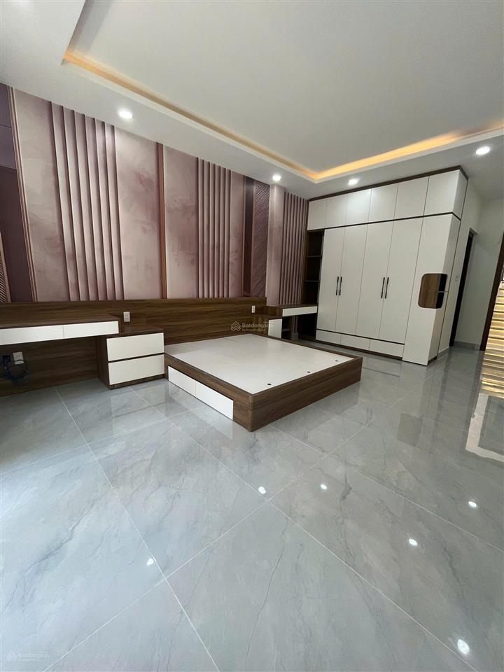 Bán nhà mt trần hưng đạo 4 tầng 4,5x21m, 7pn 8wc, gần lũy bán bích, giá 18,5 tỷ, sổ hồng