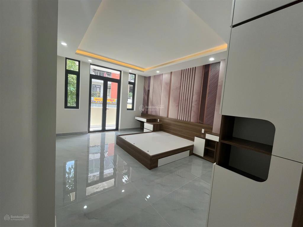 Bán nhà mt trần hưng đạo 4 tầng 4,5x21m, 7pn 8wc, gần lũy bán bích, giá 18,5 tỷ, sổ hồng