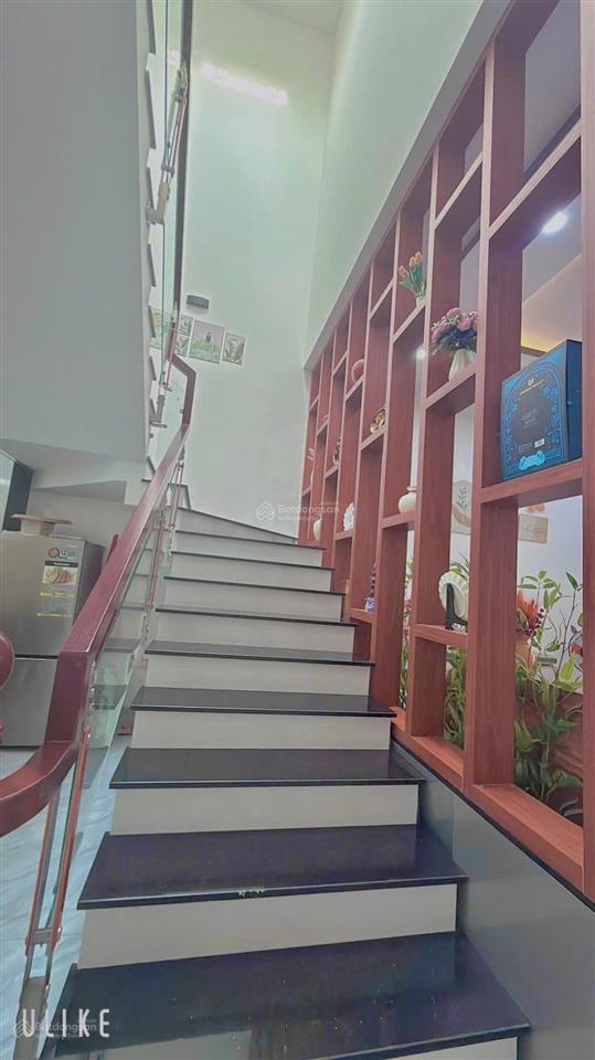 Bán nhà 1 trệt 1 lầu sổ riêng thổ cư 5,2x23 4p. ngủ  0794 290 ***