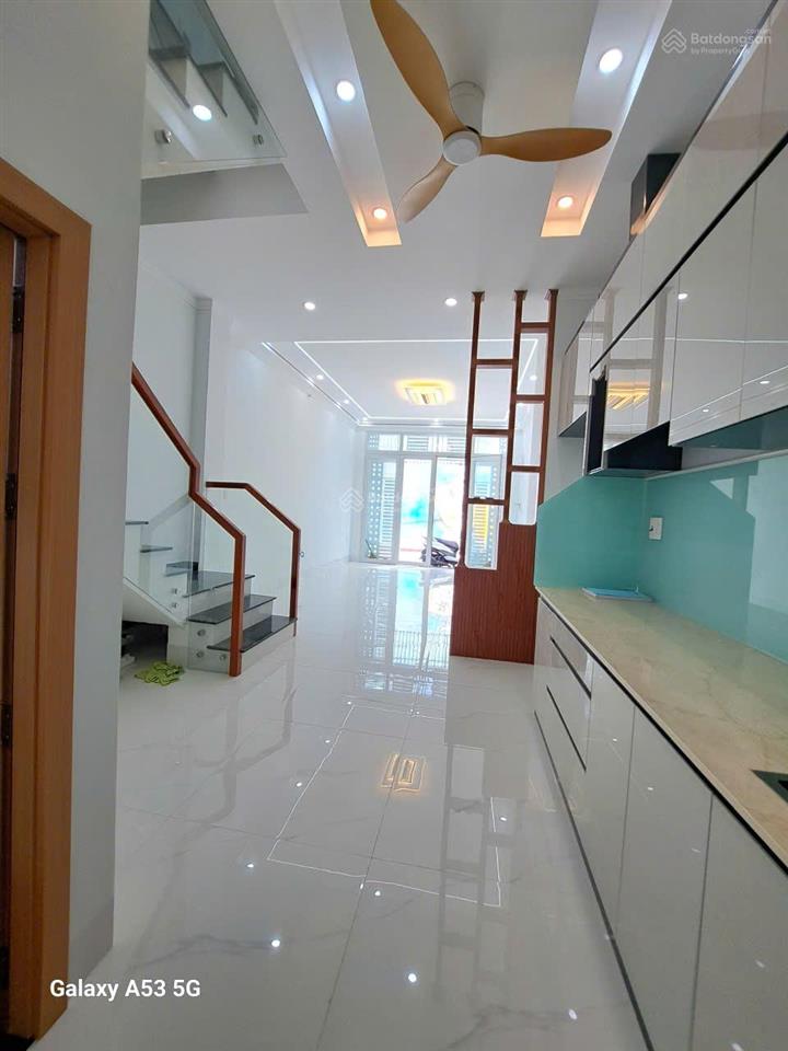 Tâm 0909 428 ***  nhà mới hxh 198 an dương vương 4x11m 4pn + st xe hơi trong nhà 6.7 tỷ