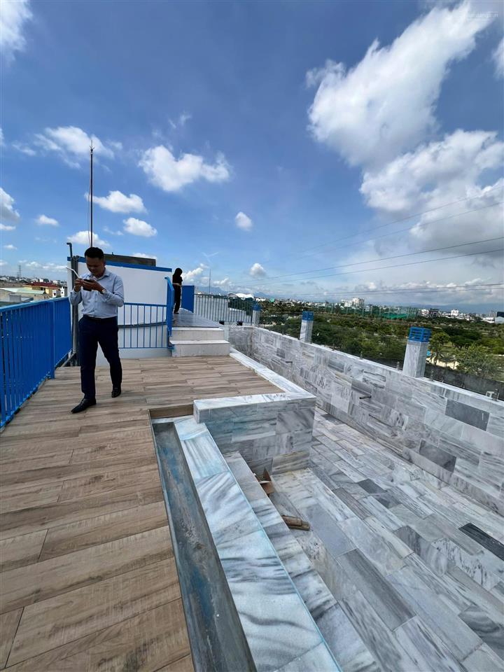 Mới 100%. bán tòa chdv đường đoàn quý phi, hòa cường, 125 m2 x 7 tầng, 27 phòng stu, dt 1.9 tỷ/năm
