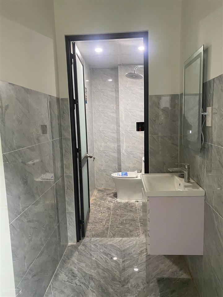Nhà 1 trệt lửng mới xây mặt tiền nhựa sau 46 căn đại đăng, (142,5m2  4tỷ2 tl)