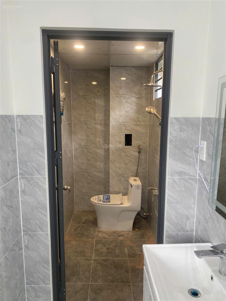 Nhà 1 trệt lửng mới xây mặt tiền nhựa sau 46 căn đại đăng, (142,5m2  4tỷ2 tl)