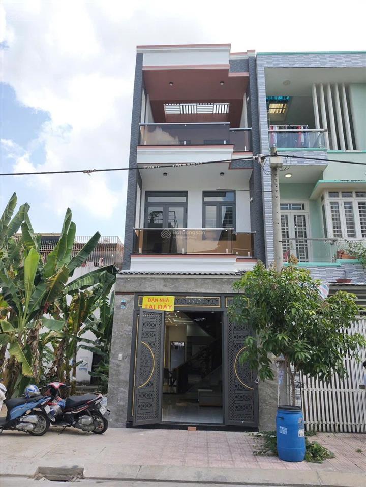 Bán nhà trệt 2 lầu mới tinh đường nhựa 8 m , gần trung tâm y tế dĩ an