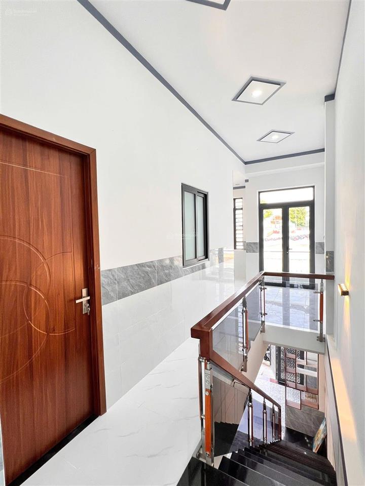 Bán nhà trệt lầu mới tinh gần chợ tân long, phường dĩ an, thành phố hồ chí minh