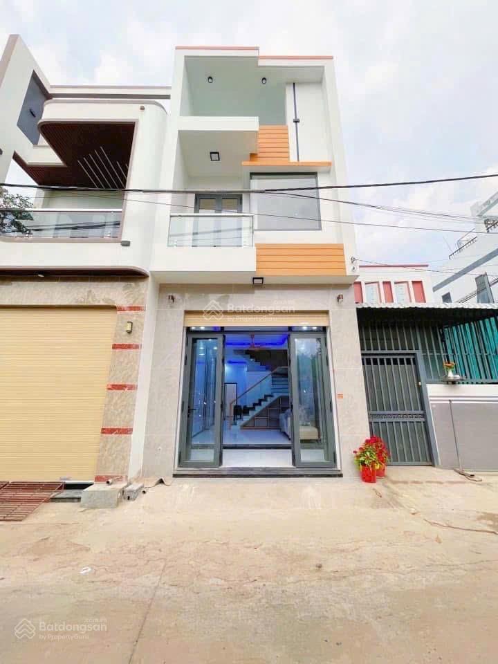 Bán nhà trệt lầu gần đường nguyễn an ninh, chợ dĩ an