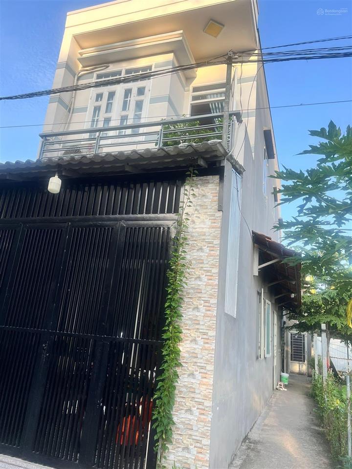 Nhà lầu + 2 phòng trọ  gần vòng xoay định hoà