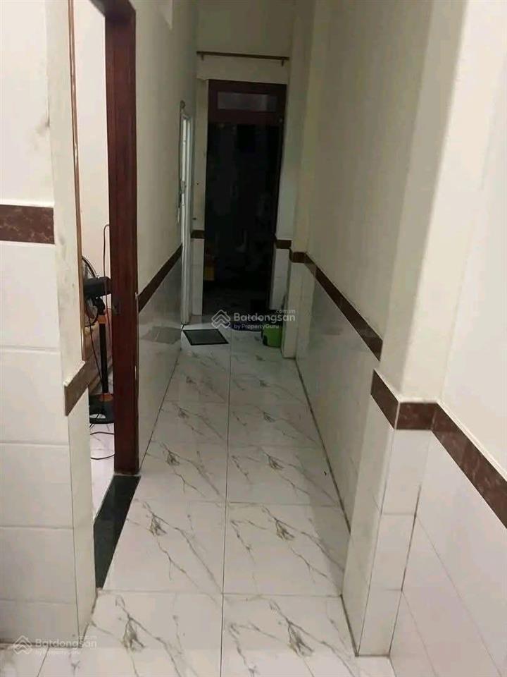 Nhà lầu đường thông gần bến xe tân đông hiệp giá 3 tỷ 880 triệu