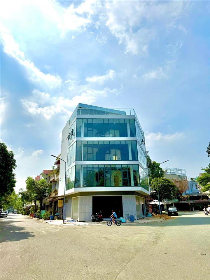 Tòa nhà văn phòng góc 2 mặt tiền ngang mt 27m thiết kế 5 tầng thang máy  thông suốt cần bán