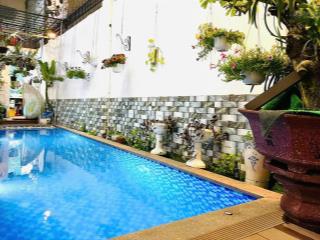 Nhà đẹp 1t lửng 2l có thang máy, hồ bơi, 1 mặt tiền 1 mặt hẻm dt 4,75x21 giá 18,5 tỷ ngay gần đl 2