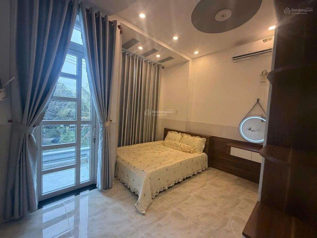 Bán gấp nhà 1 trệt 2 lầu dx07 phú mỹ cách huỳnh văn lũy vào chỉ 50m có 3 phòng ngủ sân ô tô giá tốt