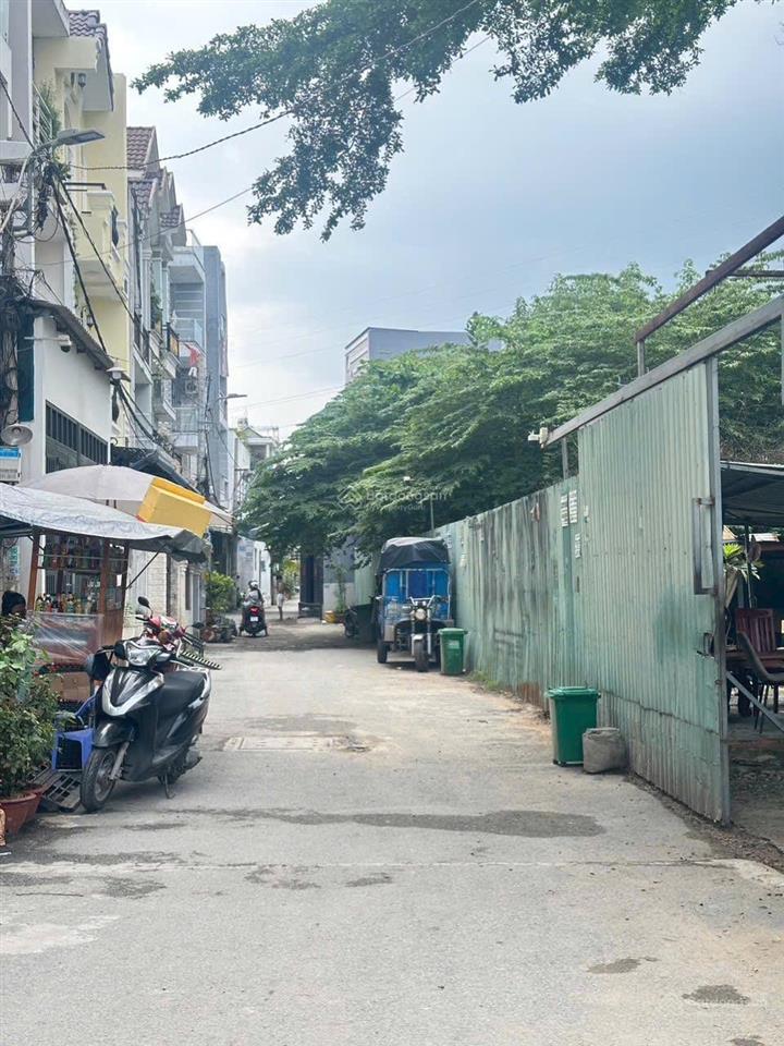 Bán 2116m nhà đất huỳnh tấn phát, p phú thuận 50mx42,3m có 2001m2 thổ cưhẻm 6,5m giá  100tr/m2