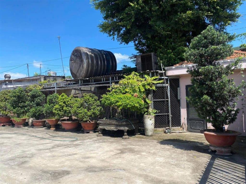 Bán kho xưởng mặt tiền đường quốc lộ 22, dt=22x100m=2200m có 300m thổ cư, trên đất có biệt thư