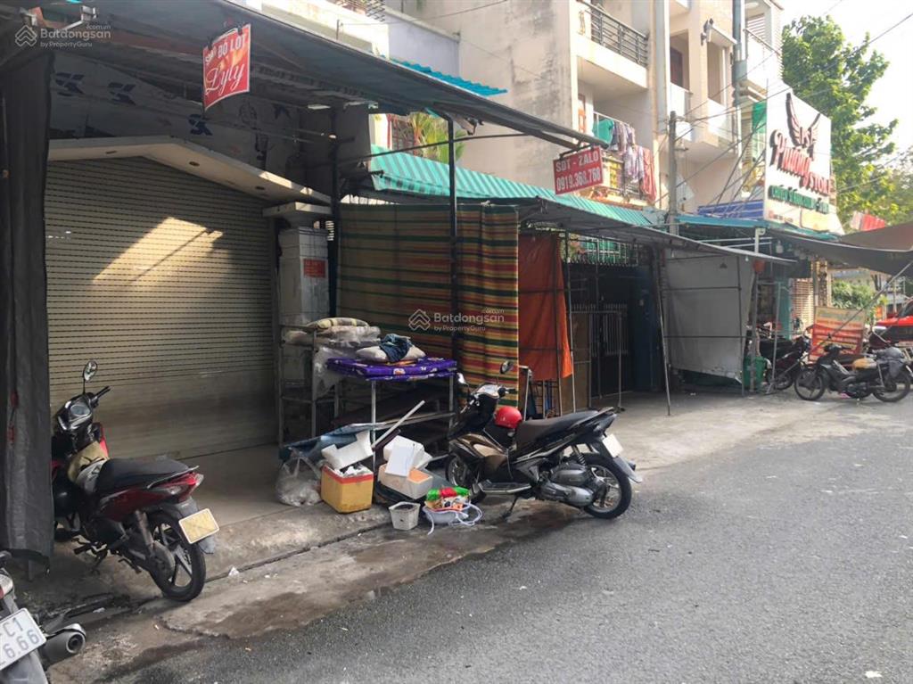 Mặt tiền bên hông chợ hạnh thông tây dt (4m x 23m) cn 90m²  4 tầng giá 12,5 tỷ.