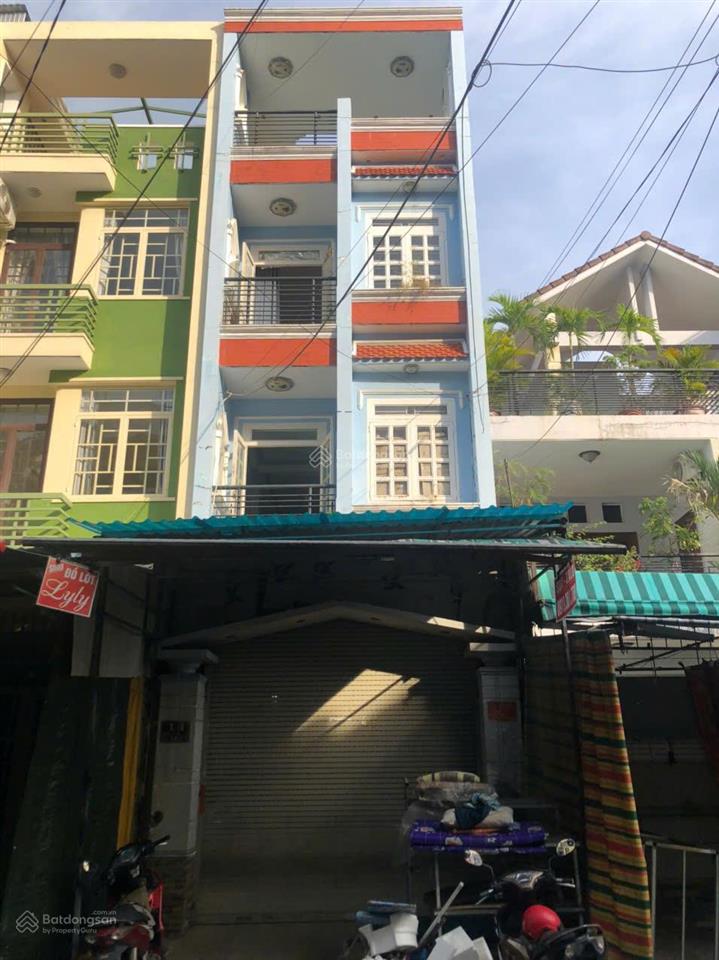 Mặt tiền bên hông chợ hạnh thông tây dt (4m x 23m) cn 90m²  4 tầng giá 12,5 tỷ.