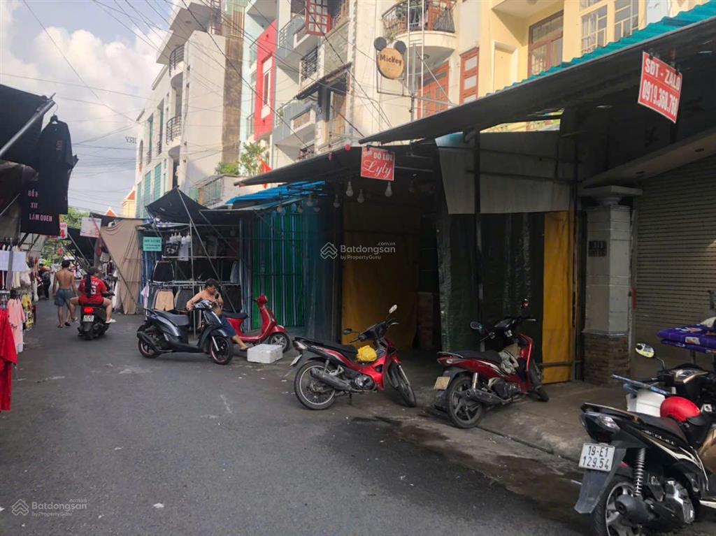 Mặt tiền bên hông chợ hạnh thông tây dt (4m x 23m) cn 90m²  4 tầng giá 12,5 tỷ.