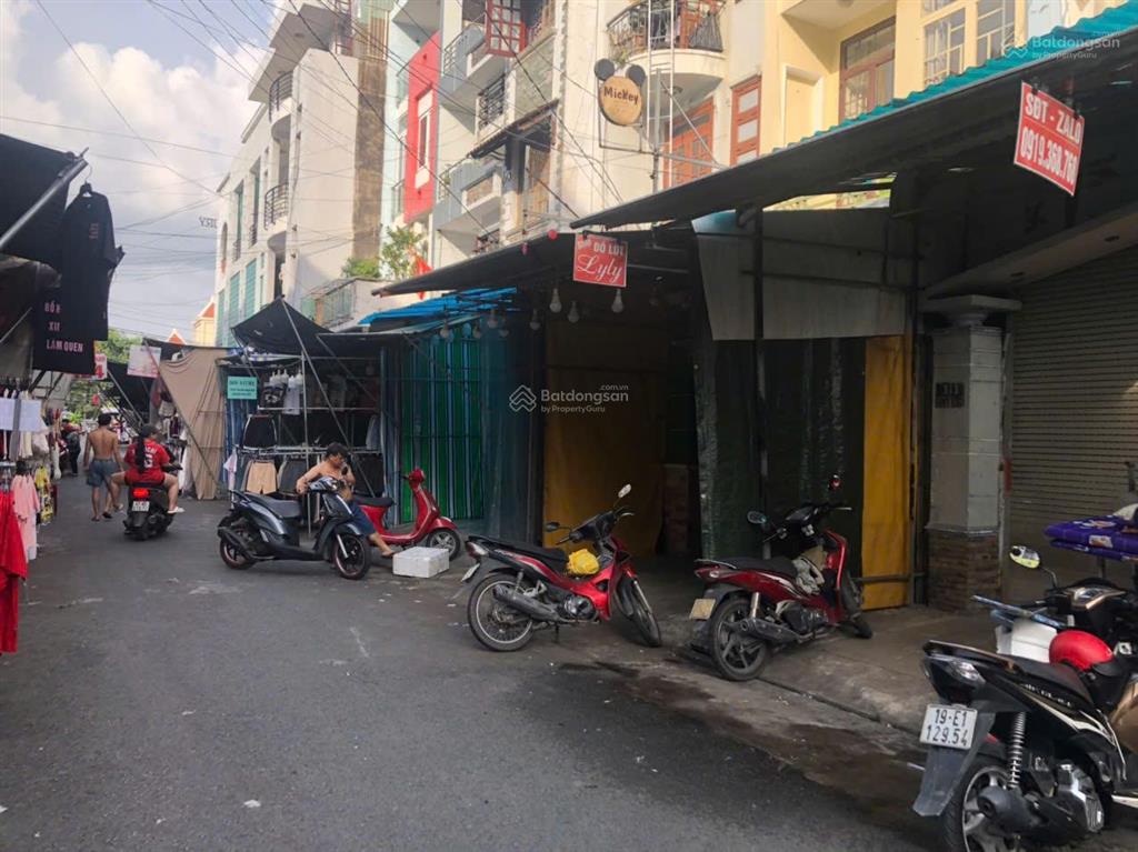 Mặt tiền bên hông chợ hạnh thông tây dt (4m x 23m) cn 90m²  4 tầng giá 12,5 tỷ.