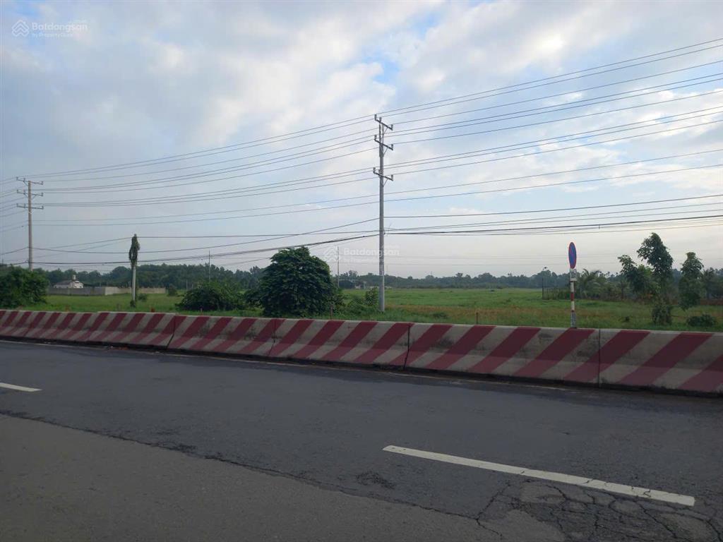 Bán đất quốc lộ 22 trảng bàng tây ninh 85m x 185m = 12.000m2, giá 25 tỷ tl