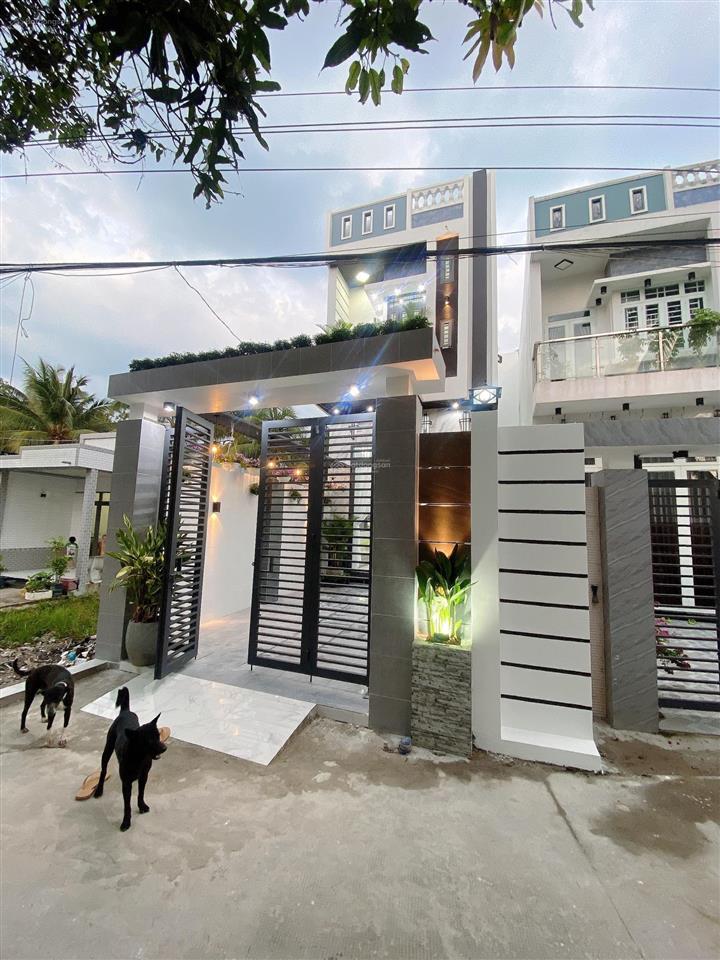 Bán nhà lầu mới hoàn thiện nhà có 4 p ngủ sân đậu được oto 7 chỗ nhà nhánh đ huỳnh thị nở