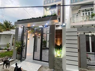 Bán nhà lầu mới hoàn thiện nhà có 4 p ngủ sân đậu được oto 7 chỗ nhà nhánh đ huỳnh thị nở