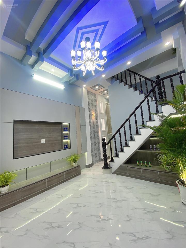 Bán nhà lầu mới hoàn thiện nhà có 4 p ngủ sân đậu được oto 7 chỗ nhà nhánh đ huỳnh thị nở