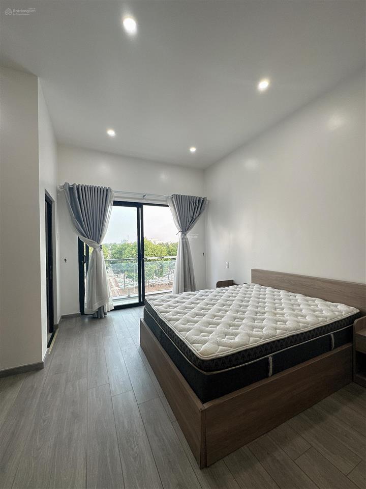 Nhà 1 trệt 2 lầu kiên cố có sân thượng mặt tiền kinh doanh đường d13 trục chính kdc hồng loan