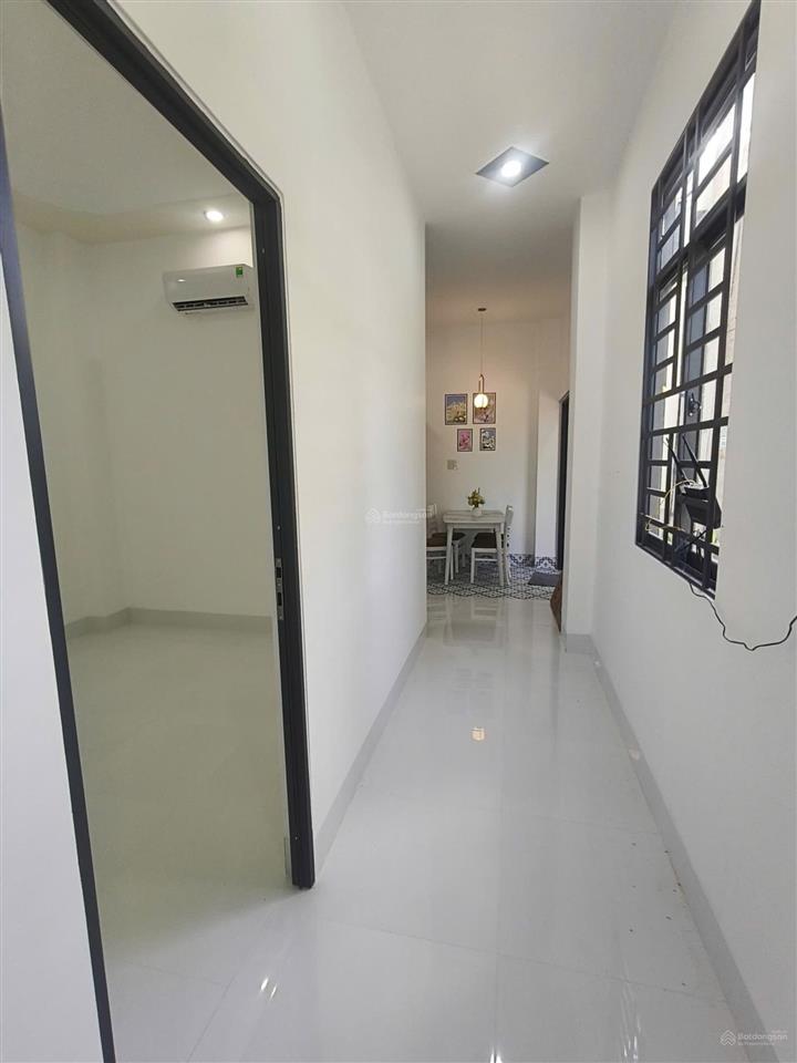 Nhà lầu mới 100%góc 2 mặt tiền lộ ôtô đậu trước nhà kế bên kdc ngân thuận cách đền hùng vương 300m