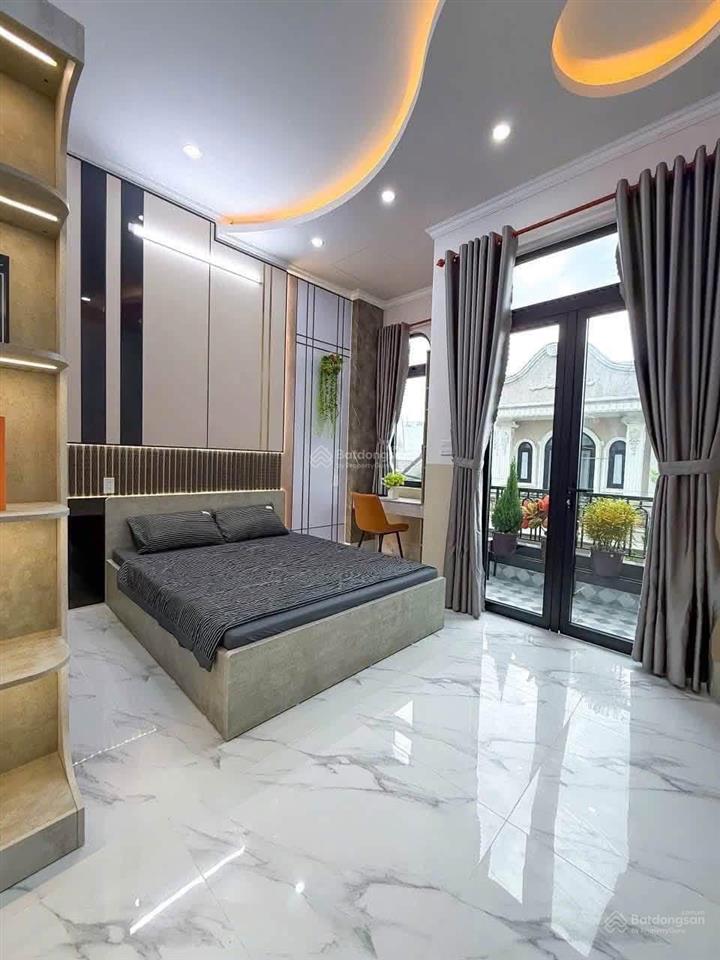 Bán nhà 1 trệt 1 lầu, mới đẹp, ô tô đậu trong nhà, gần bệnh viện nhi đồng, trường đh fpt