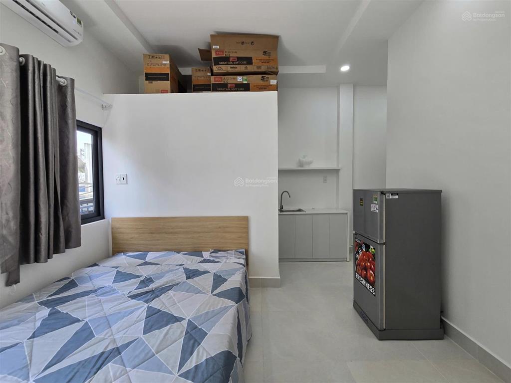 Căn hộ dịch vụ mới 100% cạnh phú mỹ hưng đầy đủ nội thất giờ tự do cửa vân tay camera 24/24