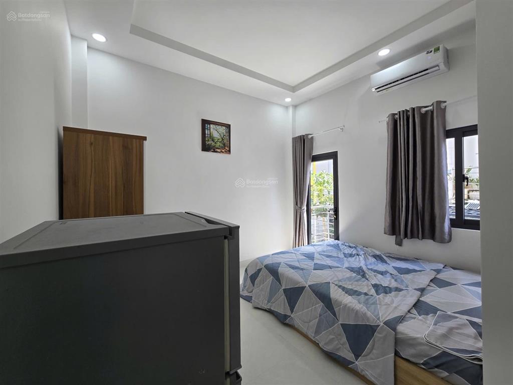 Căn hộ dịch vụ mới 100% cạnh phú mỹ hưng đầy đủ nội thất giờ tự do cửa vân tay camera 24/24